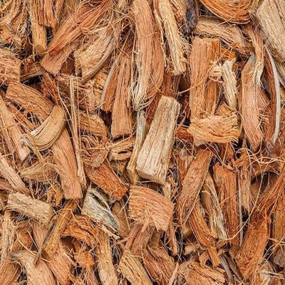 A close up view of loose coconut husk chips. 
