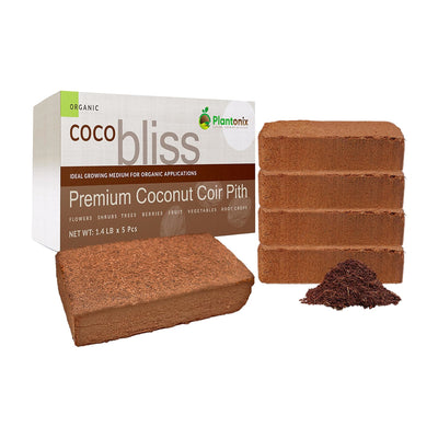 Five blocks of coco coir in front of a premium coconut coir pith. There is a loose pile of coco to show texture. 