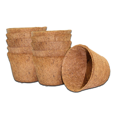 Two stacks of 5 Coco Bliss coco coir pots, with one laying on it's side.